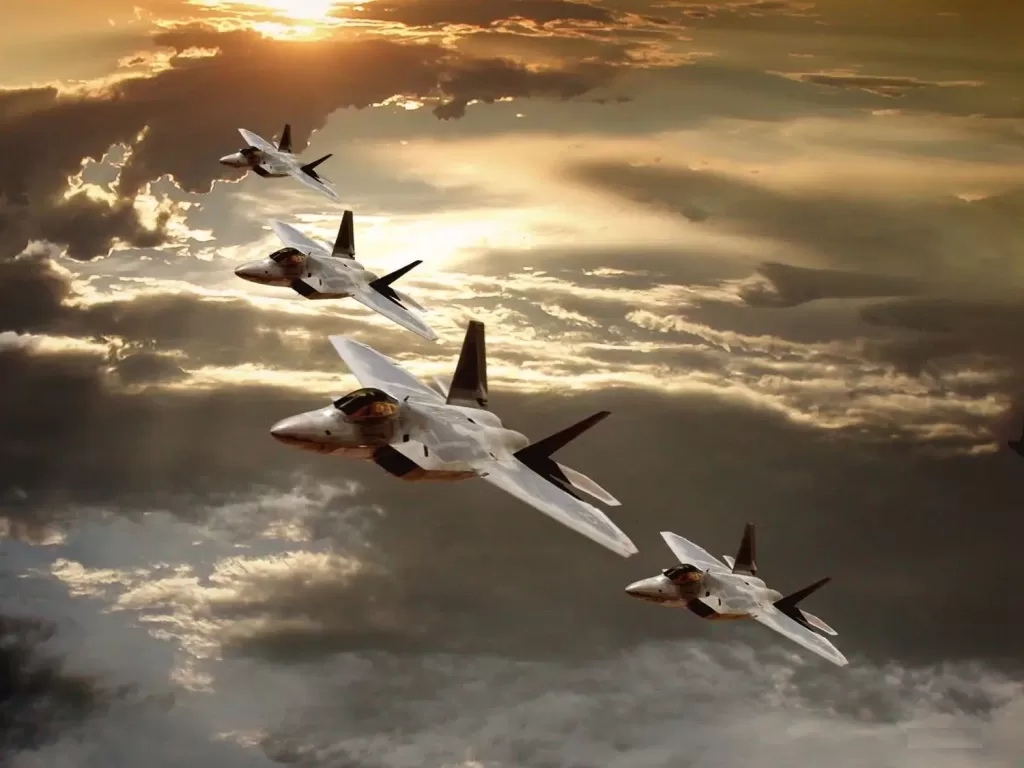 Four Lockheed Martin F-22 Raptors in mid-air formation